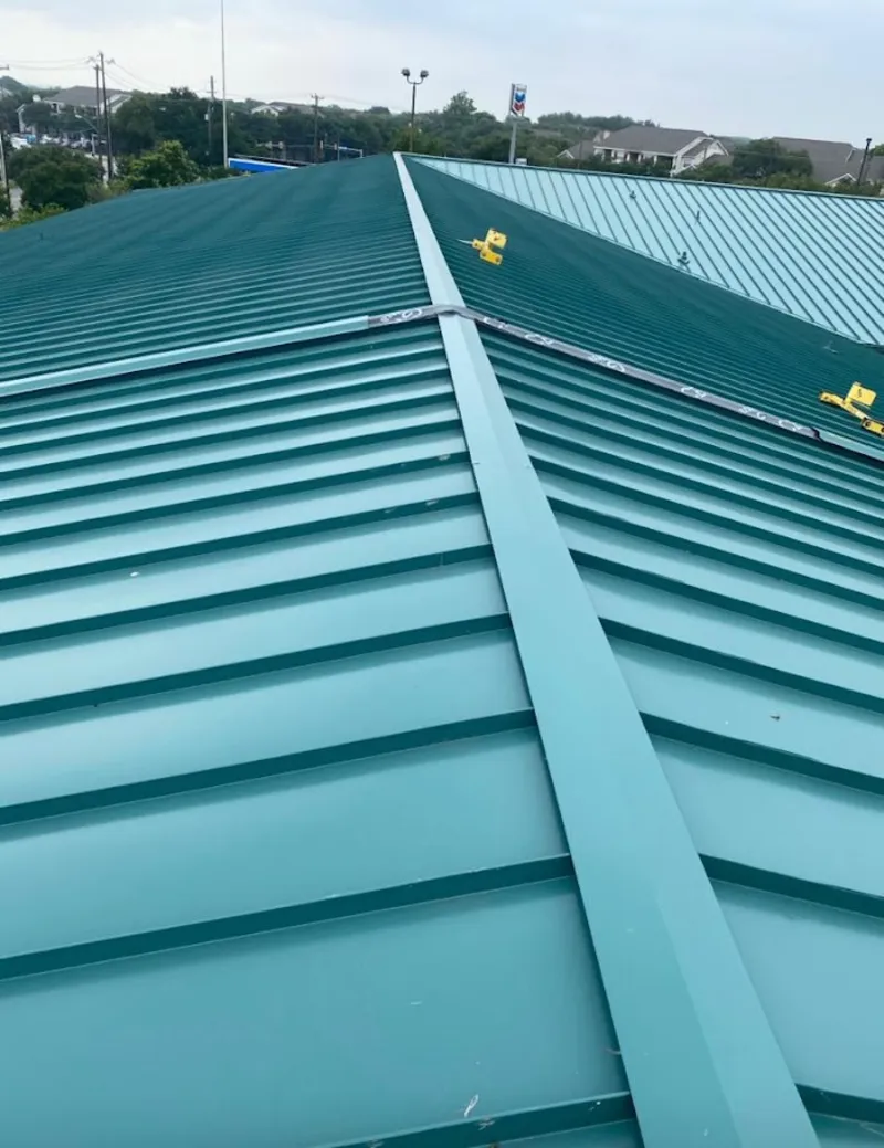 Green commercial metal roof ridge and valley for Metal Roof Repair in San Anselmo